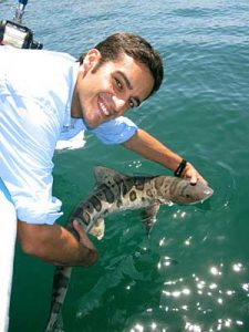 Dr. Nosal with a local leopard shark. 